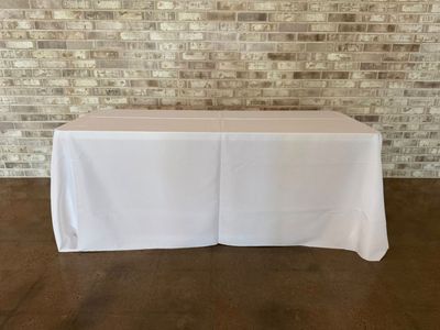 Rectangular table with white linens
