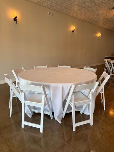 Round table with white linens