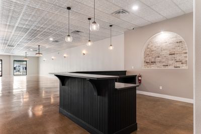 Modern bar area with brick accents