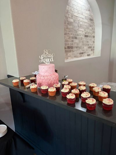 Pink So Loved birthday cake with matching cupcakes
