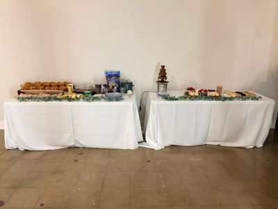 Buffet tables featuring a chocolate fountain
